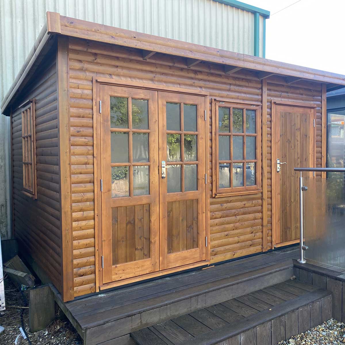 Tanalised Log Pent Studio